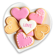 Um prato branco em formato de coração com biscoitos em formato de coração decorados. 