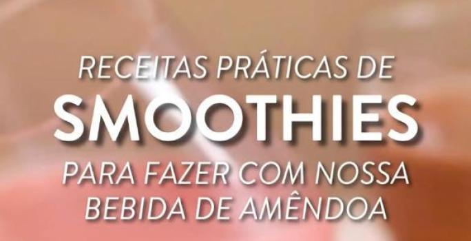 Foto da receita de smoothie de mirtilo com bebida vegetal nature's heart servida em duas porções em copos de vidro. A frente há um lettering escrito "receitas práticas de smoothies para fazer com nossa bebida de amêndoa"